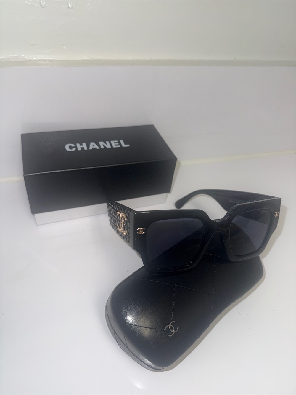 CHANEL Black Square Sunglasses with Quilted Temples and Gold CC Accents
